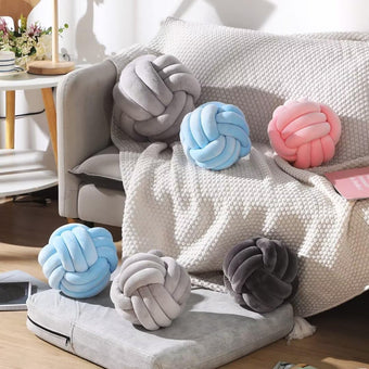 Coussin décoratif tressé 3 brins