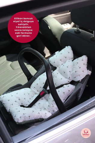 Réducteur / Coussin universel pour bébé beige.
